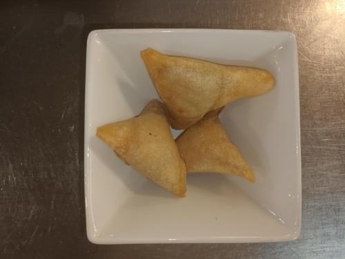 a white plate with three pieces of food on it at Holiday Inn Rochester-Chatham by IHG in Chatham