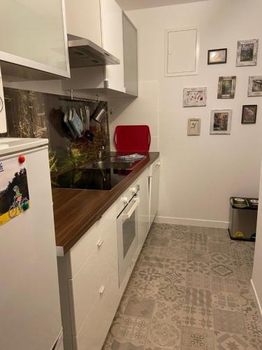 a kitchen with a sink and a counter top at Apartment Seeidyll in Groß Köris