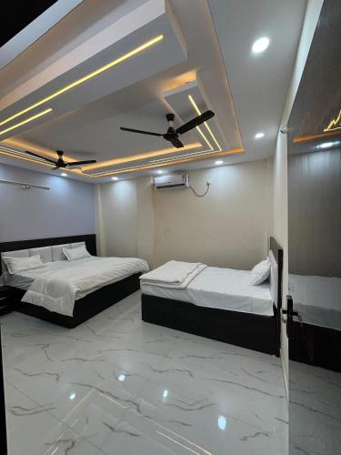 Katil atau katil-katil dalam bilik di Hotel Citylight