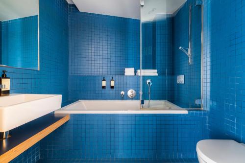 Koupelna v ubytování Le Citizen Hotel
