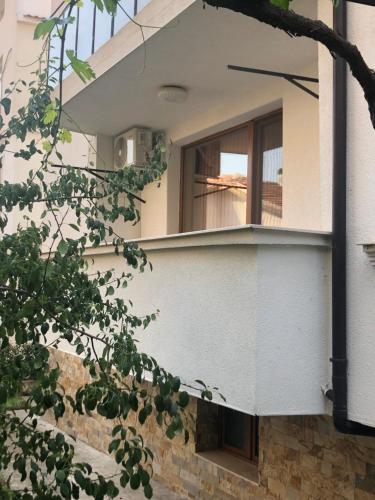 a window on the side of a building at Bety in Sandanski