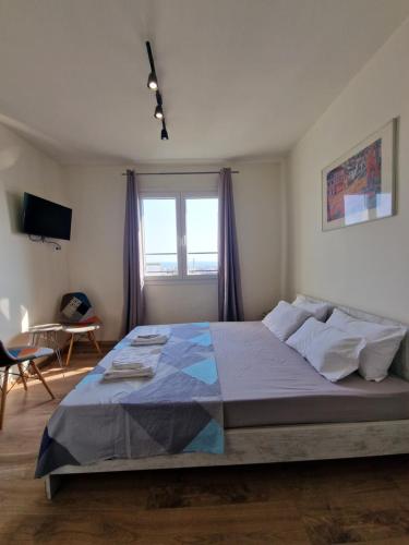 Posteľ alebo postele v izbe v ubytovaní City Center Penthouse Apartment