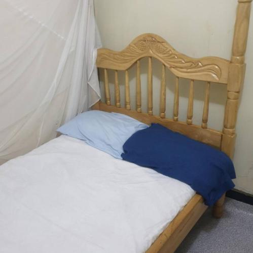 Una cama o camas en una habitación de KBK COMFORT Accommodation