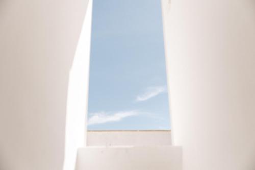 an open window with a view of the sky at Palais Gentile Matino in Matino