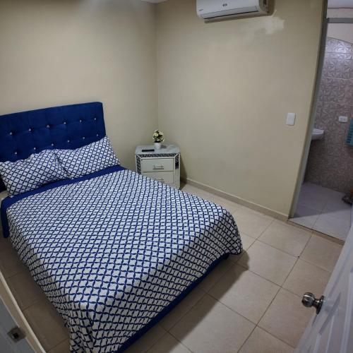 Postel nebo postele na pokoji v ubytování Complejo de apartamentos Mariela