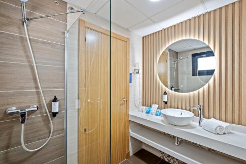 Koupelna v ubytování Hotel Puente Real