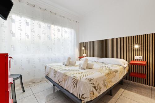Postel nebo postele na pokoji v ubytování Sol Montemar 10 by IVI Real Estate