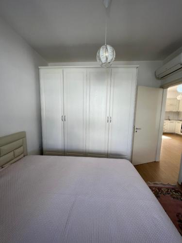 Postel nebo postele na pokoji v ubytování CASA AL MARE, Lura 3 Gjiri i Lalzit