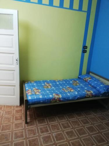 Postel nebo postele na pokoji v ubytování Nasser