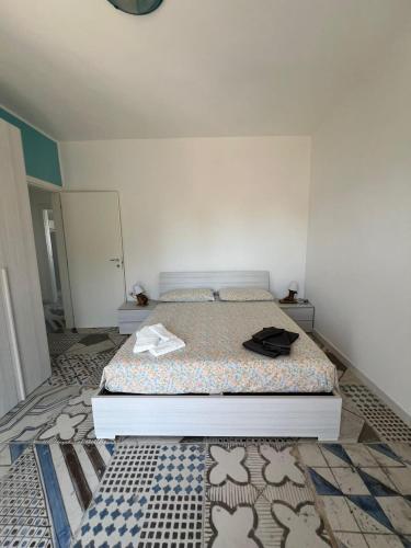 a bedroom with a bed in a room at Aurora e Alba in Casalabate