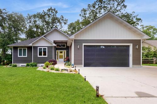 a house with a garage at Oak Street Beach House in New Buffalo