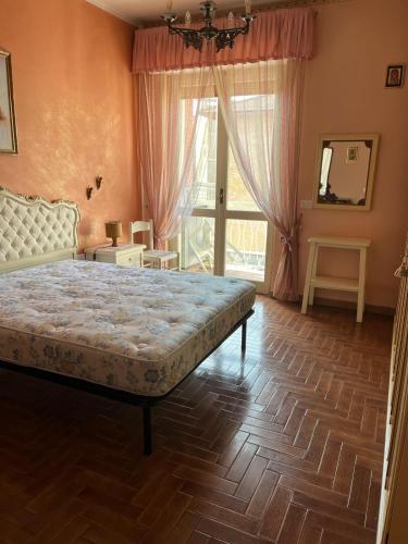 Ένα ή περισσότερα κρεβάτια σε δωμάτιο στο Dimora Lunense