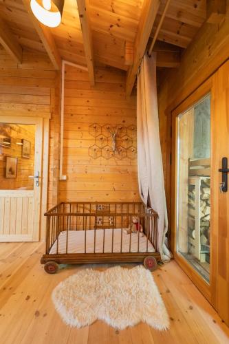Ένα ή περισσότερα κρεβάτια σε δωμάτιο στο Le Chalet de Limbre