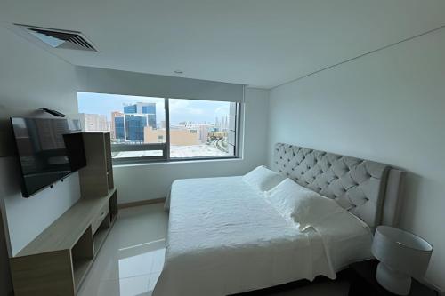 Postel nebo postele na pokoji v ubytování Apartamento en Bluegardens 1405