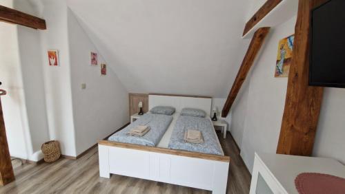 Apartmán Kamarytkaにあるベッド