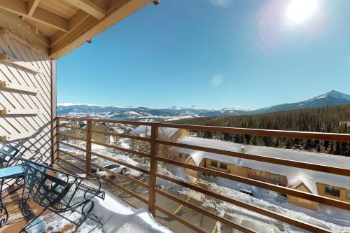 a balcony with a view of a train at Buffalo Ridge 205 in Silverthorne