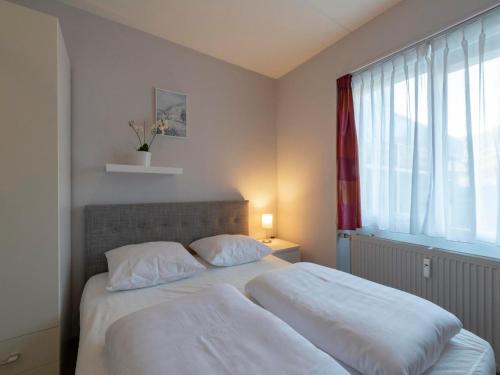 Postel nebo postele na pokoji v ubytování Apartment in Callantsoog near the Beach