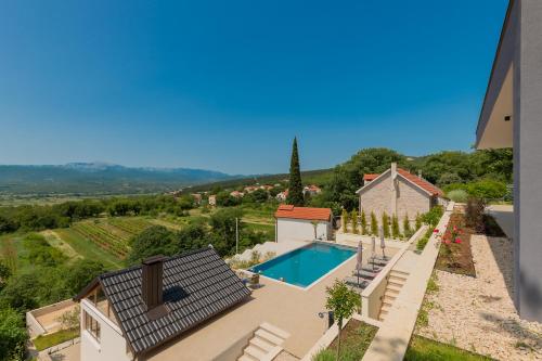an aerial view of a villa with a swimming pool at Luxury Villa Dobri Dida in Imotski