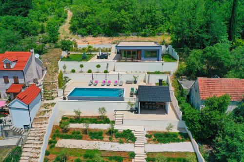 an aerial view of a house with a swimming pool at Luxury Villa Dobri Dida in Imotski