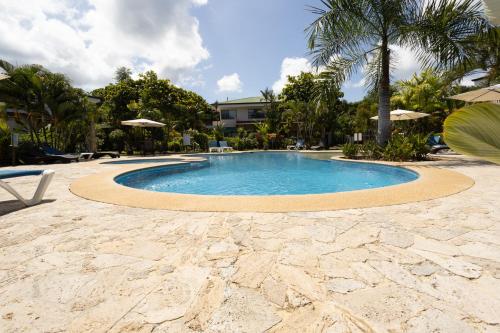 Condo Pacificoの敷地内または近くにあるプール