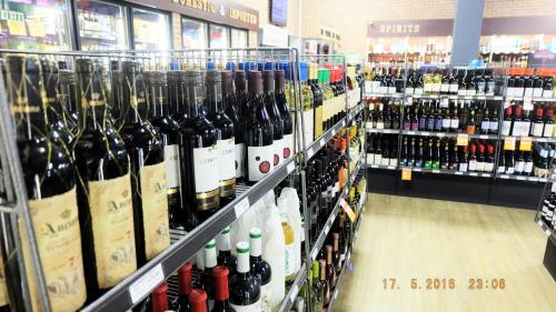 a store filled with lots of bottles of wine at Pemberton Hotel (Motel) in Pemberton