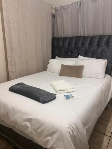 Ένα ή περισσότερα κρεβάτια σε δωμάτιο στο Tesco Accommodation