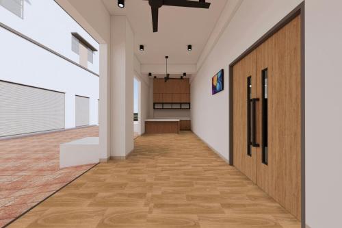 an office corridor with wooden doors and wooden floors at Fairfield by Marriott Kuala Besut in Kuala Besut