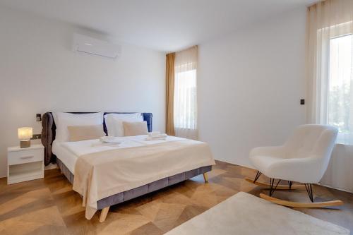 Giường trong phòng chung tại Villa Tina Family Resort Plitvice Lakes