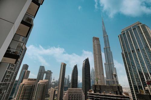 a view of a city skyline with skyscrapers at Burj Crown Luxury 4 Bedroom, Balcony Views, 5 min to Burj Khalifa in Dubai