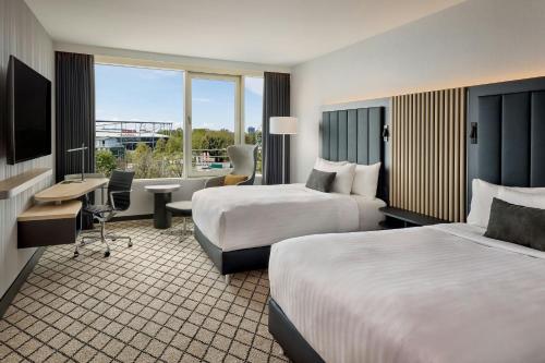 Katil atau katil-katil dalam bilik di Courtyard by Marriott Hannover Maschsee