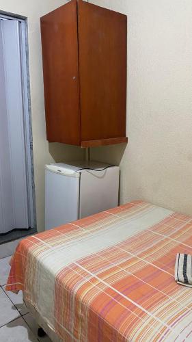 Postel nebo postele na pokoji v ubytování Pousada e Alojamento Engenho de Itaguaí