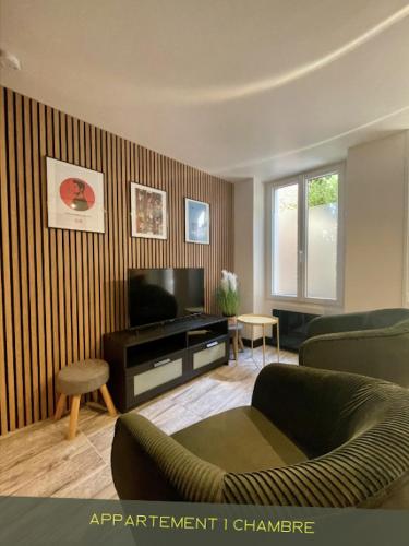 Χώρος καθιστικού στο Les Appartements du Pont Joubert