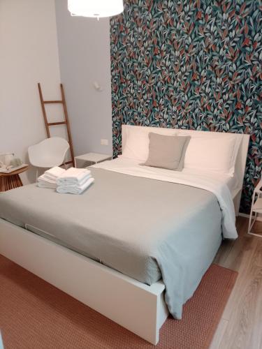 Postel nebo postele na pokoji v ubytování Rooms La Spezia 5 Terre