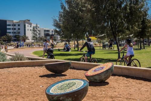 a group of people riding bikes in a park at Rangeway Rescue - Older 3BR Home in Geraldton