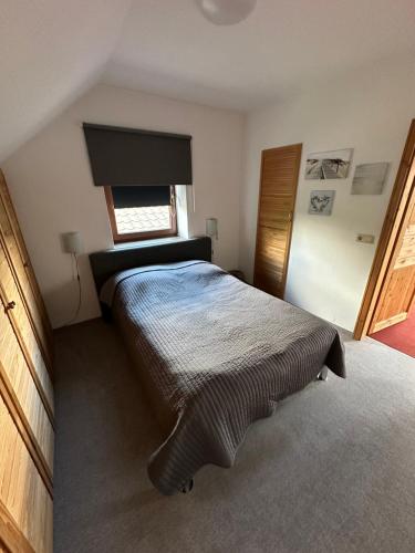 Postel nebo postele na pokoji v ubytování Ferienwohnung LaMa