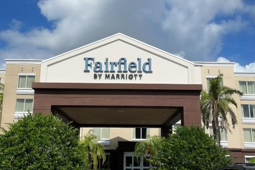 a hotel sign on top of a building at Fairfield by Marriott Inn & Suites Melbourne West/Palm Bay in Melbourne