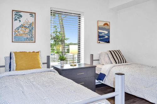 Ένα ή περισσότερα κρεβάτια σε δωμάτιο στο The Well #205