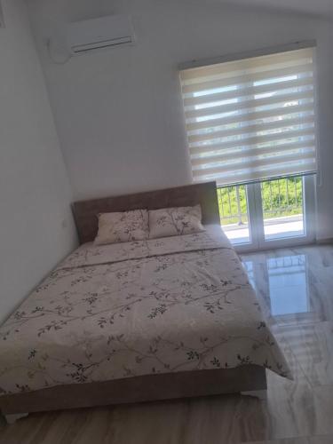 Katil atau katil-katil dalam bilik di Apartman Andjela 3