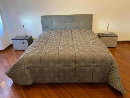 Postel nebo postele na pokoji v ubytování La Casa di Ester Three-room apartment