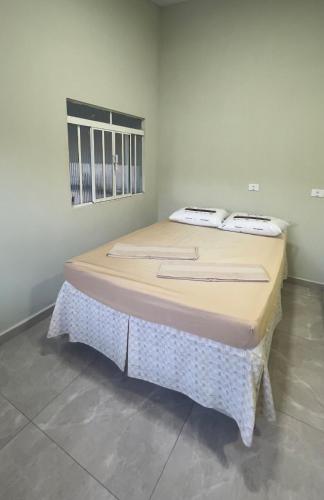 Katil atau katil-katil dalam bilik di Casa com 6 quartos churrasqueira e piscina