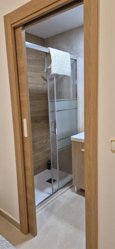 a bathroom with a shower with a glass door at Vinaros Beach in Vinarós