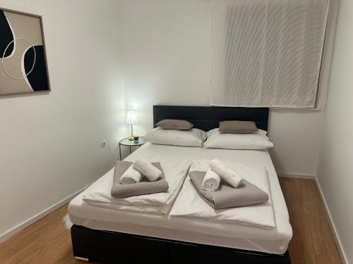 Katil atau katil-katil dalam bilik di Apartman Obala deLuxe