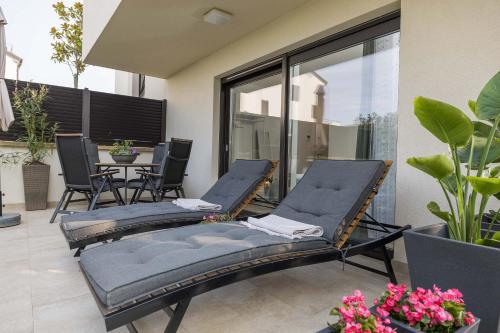 Μια τηλεόραση ή/και κέντρο ψυχαγωγίας στο Studio Apartment Rosa Krk