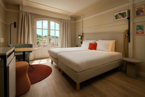 La Bastide de Mougins, a Tribute Portfolio Hotelにあるベッド