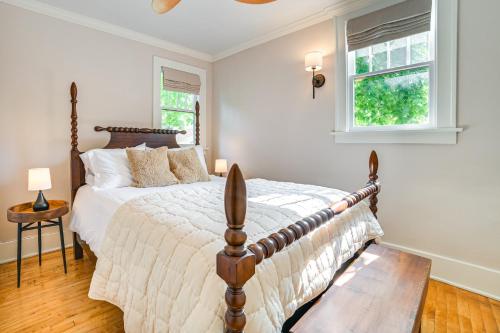 a bedroom with a bed and a window at Walk to Dtwn Cozy Getaway with Patio in Charlevoix in Charlevoix