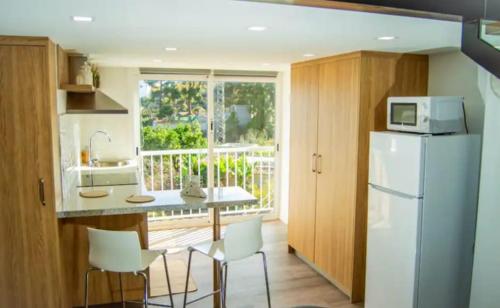 Kuchyň nebo kuchyňský kout v ubytování Loft Vista al Teide