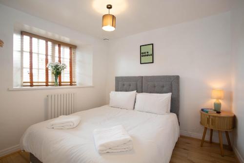 En eller flere senge i et værelse på East farm cottages