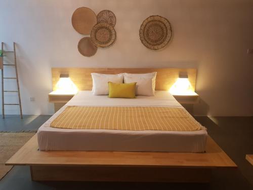 Postel nebo postele na pokoji v ubytování Villas Rocher - Deluxe Suite 3C