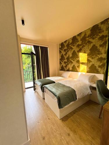 Una cama o camas en una habitación de Hotel Canudos