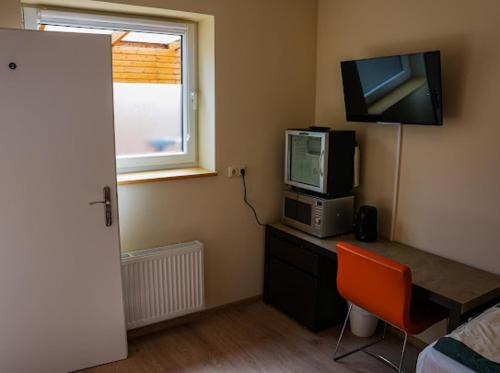 Μια τηλεόραση ή/και κέντρο ψυχαγωγίας στο Haus Feierabend